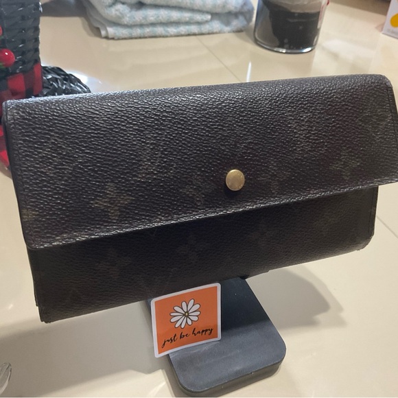 Louis Vuitton Handbags - Louis Vuitton Sarah Wallet has COA  and a dust cover.🌟